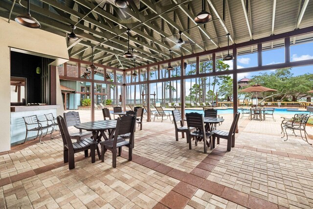 view of patio featuring a community pool