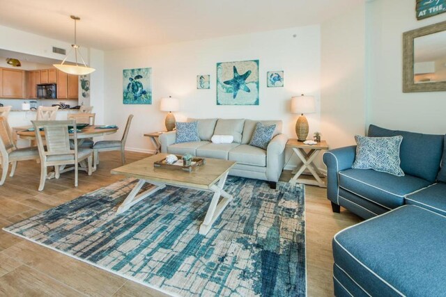 living room with light wood-type flooring