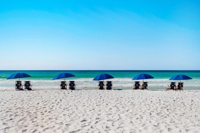 water view featuring a beach view