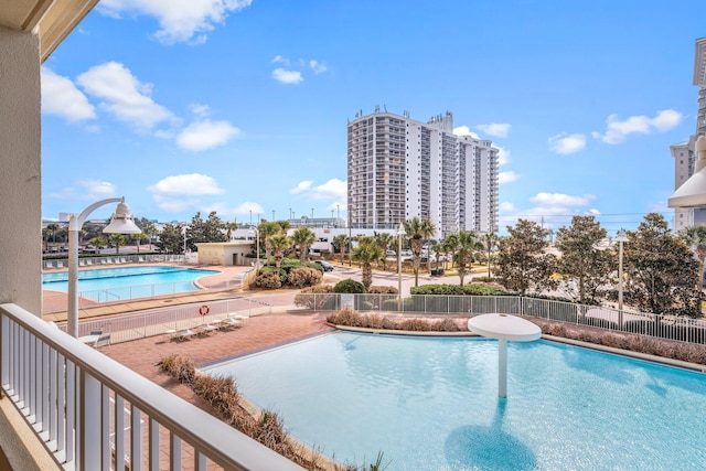 view of swimming pool featuring a patio