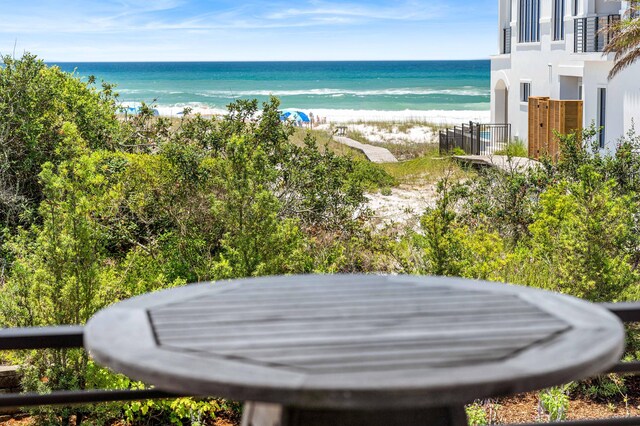 view of water feature with a beach view