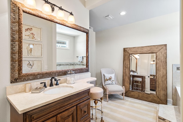 bathroom featuring a bathtub and vanity