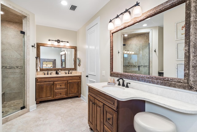 bathroom featuring vanity, baseboards, visible vents, recessed lighting, and a shower stall