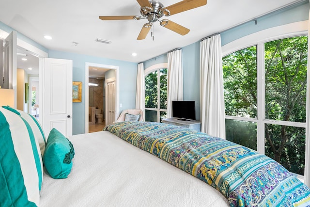 bedroom with visible vents, recessed lighting, connected bathroom, and a ceiling fan