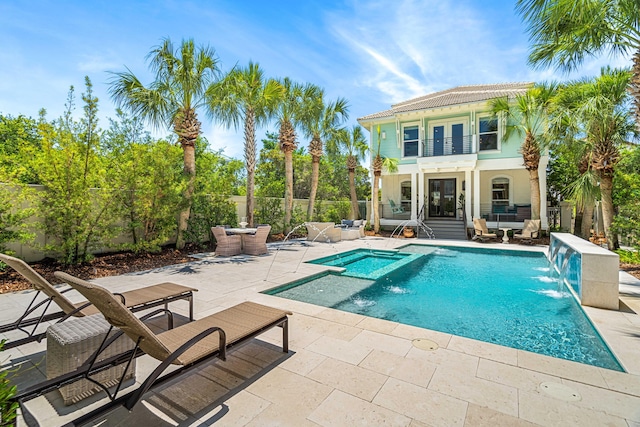 view of pool featuring a patio, fence, and a fenced in pool