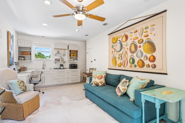 living room with visible vents, recessed lighting, light wood-type flooring, and ceiling fan