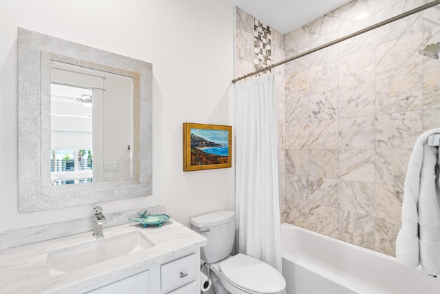 full bathroom featuring toilet, vanity, and shower / bathtub combination with curtain