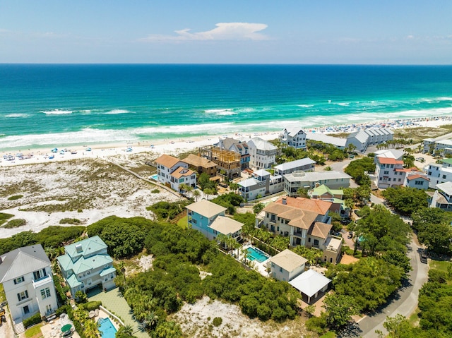 bird's eye view with a beach view and a water view