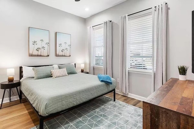 bedroom featuring hardwood / wood-style flooring