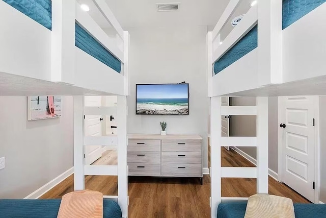 interior space featuring dark hardwood / wood-style floors and ensuite bathroom