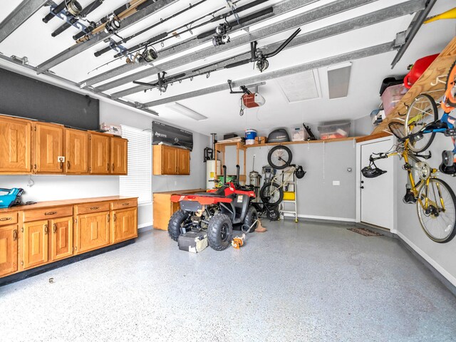 garage featuring baseboards