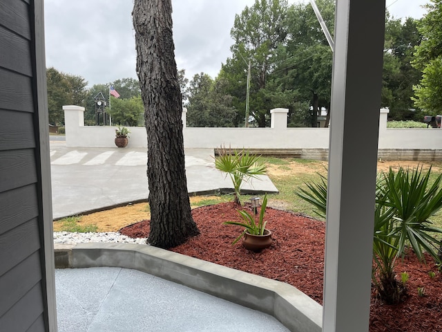 view of yard featuring a patio area and fence