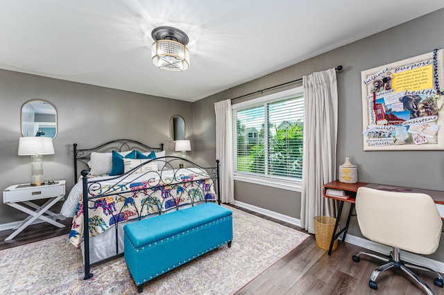 bedroom with wood-type flooring