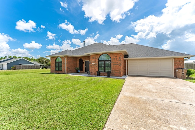 single story home with a front lawn and a garage