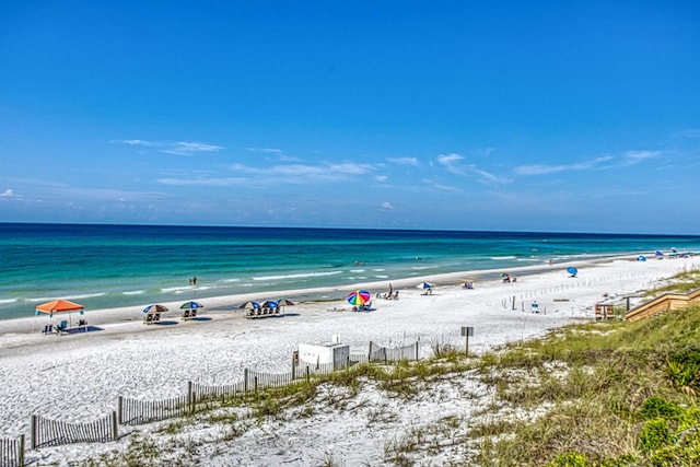 property view of water featuring a beach view