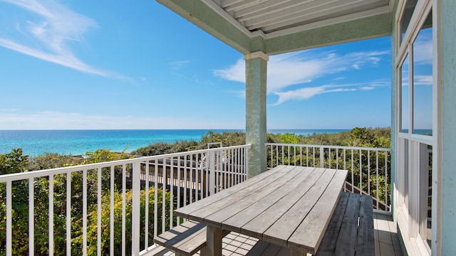 balcony featuring a water view