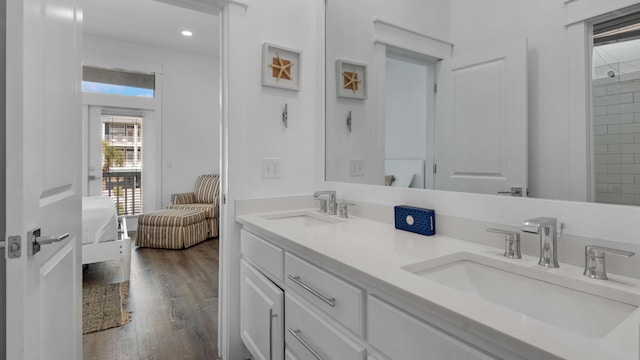 bathroom featuring vanity and wood-type flooring