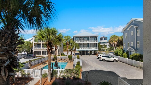 55 Nature Way Unit 100-1, Santa Rosa Beach, FL 32459 - view of pool featuring a gate and a fenced backyard