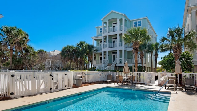 view of swimming pool with a patio