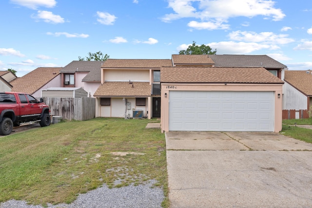 1840 E Mallard Dr Apt C, Panama City, FL 32404 - multi unit property with a front yard, fence, and stucco siding