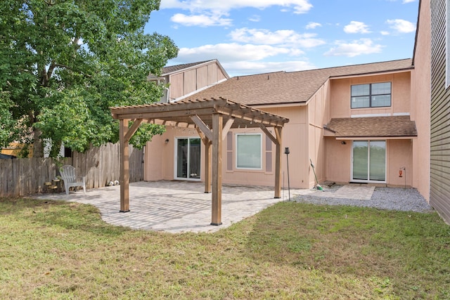 1840 E Mallard Dr Apt C, Panama City, FL 32404 - rear view of property with a pergola, a lawn, fence, and a patio