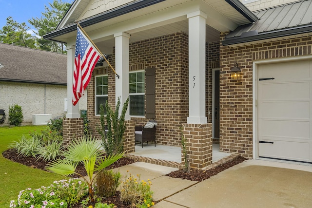 doorway to property featuring a garage