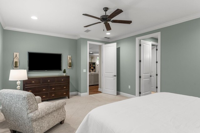 bedroom featuring ceiling fan, ornamental molding, and light carpet