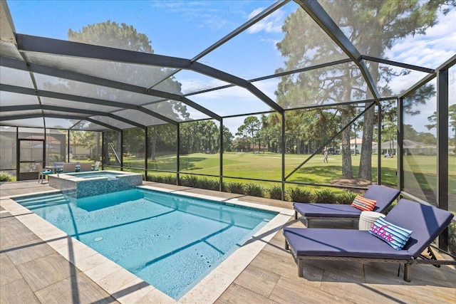 view of pool with a yard, an in ground hot tub, a lanai, and a patio area