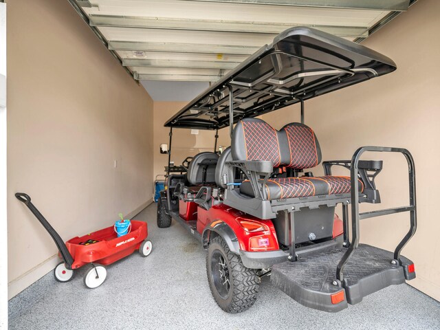 garage featuring a carport