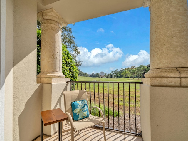 balcony featuring a rural view