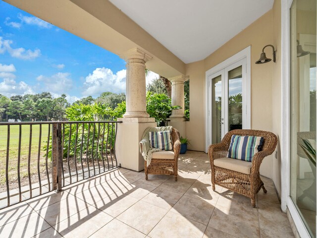 balcony featuring french doors