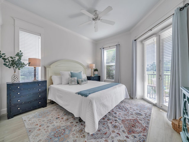 bedroom with access to exterior, ceiling fan, crown molding, and light wood-type flooring