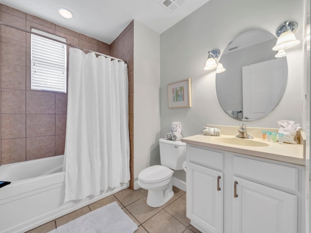 bathroom with vanity, shower / bathtub combination with curtain, visible vents, tile patterned flooring, and toilet