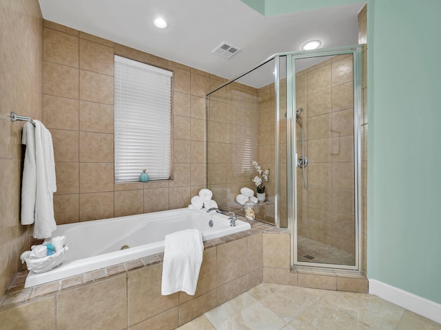 full bathroom with tile patterned floors, visible vents, a shower stall, and a garden tub