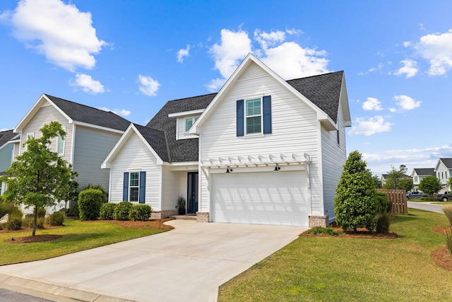 front of property with a front lawn and a garage