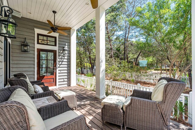 view of patio featuring an outdoor living space and ceiling fan