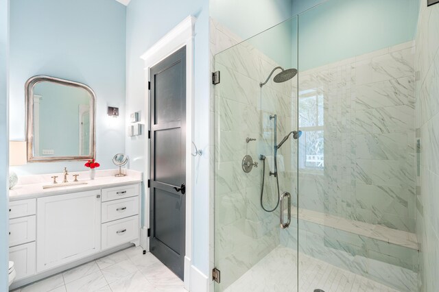 bathroom featuring vanity and walk in shower