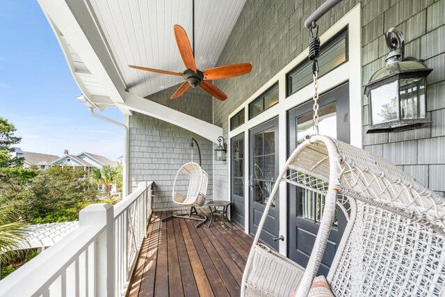 balcony featuring ceiling fan