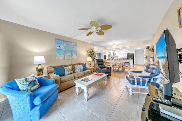 909 Santa Rosa Blvd Unit 211, Fort Walton Beach, FL 32548 - living room with tile patterned floors and a ceiling fan
