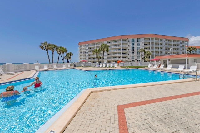 view of pool with a patio area