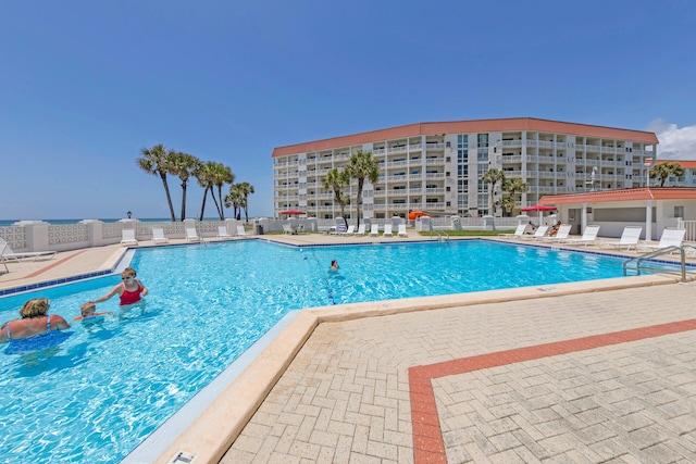 909 Santa Rosa Blvd Unit 211, Fort Walton Beach, FL 32548 - community pool with a patio and fence