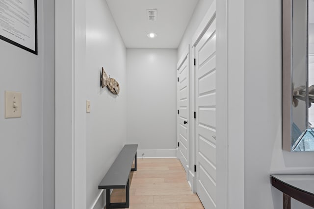 hallway featuring light hardwood / wood-style floors