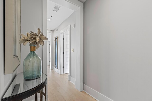 corridor featuring light hardwood / wood-style flooring