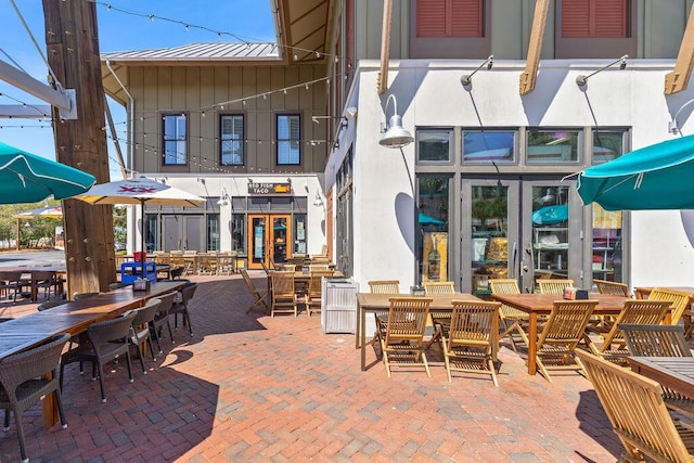 view of patio / terrace featuring french doors and outdoor dining area