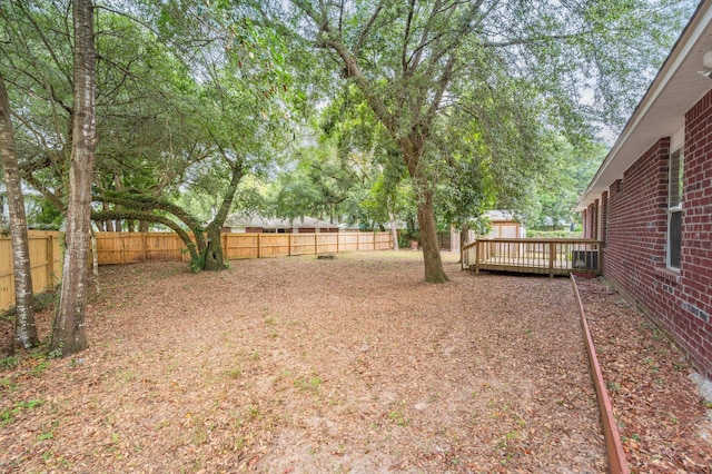 view of yard featuring a deck