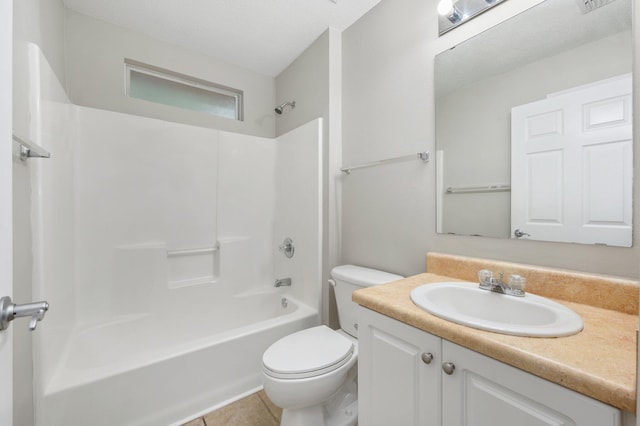 full bathroom with a textured ceiling, vanity, shower / washtub combination, toilet, and tile patterned floors