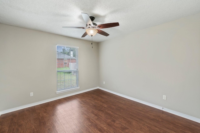 unfurnished room with ceiling fan, wood-type flooring, and a textured ceiling