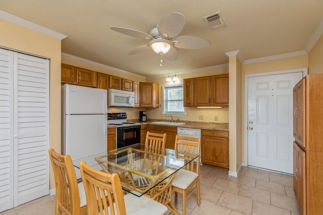 kitchen featuring crown molding, white appliances, light tile patterned floors, and ceiling fan