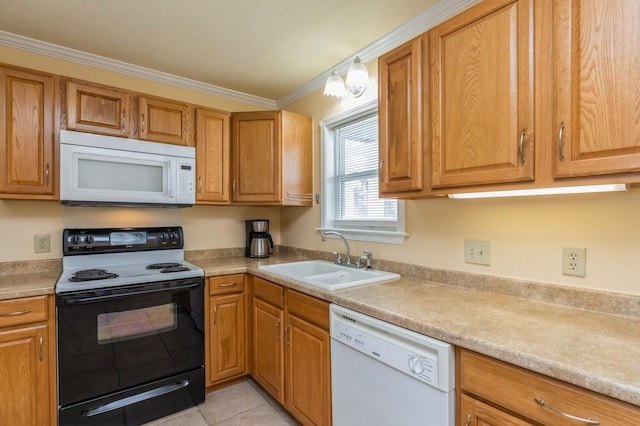 kitchen featuring white appliances, light tile patterned floors, crown molding, and sink