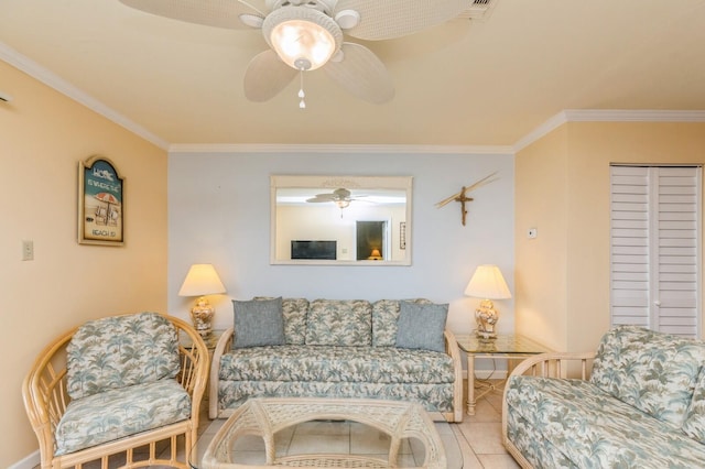 living room with crown molding, ceiling fan, and light tile patterned flooring